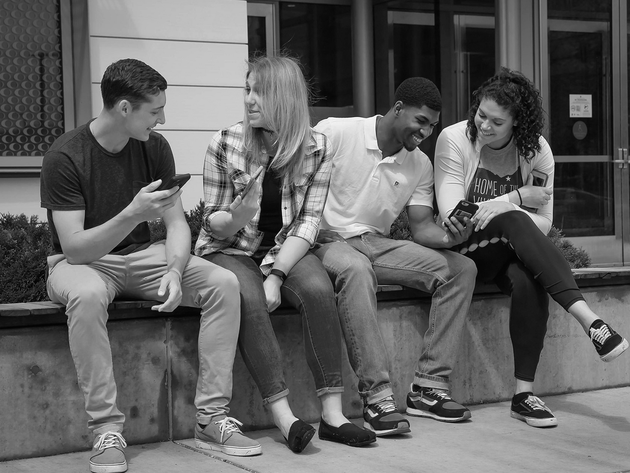 Photo of group of CSU students sitting in the plaza